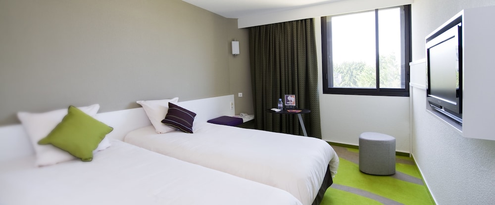 Habitación Standard con 2 camas individuales del hotel Ibis Styles Bordeaux Aeroport. Foto 1