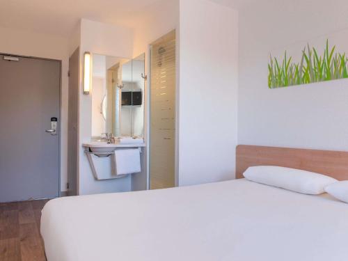 Habitación Doble del hotel ibis budget Aeropuerto Marsella Provenza. Foto 1