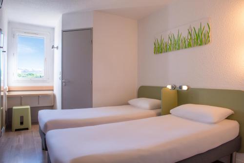 Habitación Doble - 2 camas del hotel ibis budget Aeropuerto Marsella Provenza. Foto 1