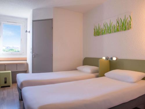 Habitación Doble - 2 camas del hotel ibis budget Aeropuerto Marsella Provenza. Foto 2