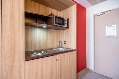 Estudio con cama doble del hotel Aparthotel Adagio Lyon Patio Confluence. Foto 12