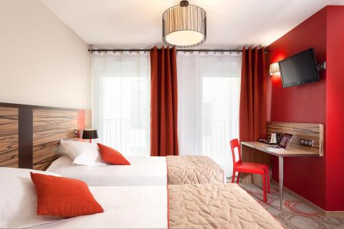 Estudio con 2 camas individuales del hotel Aparthotel Adagio Lyon Patio Confluence. Foto 6