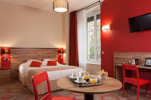 Estudio Triple del hotel Aparthotel Adagio Lyon Patio Confluence. Foto 5