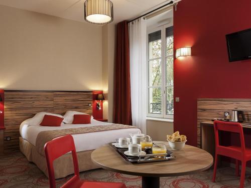Estudio Triple del hotel Aparthotel Adagio Lyon Patio Confluence. Foto 2