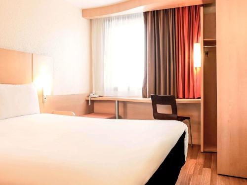 Habitación Doble Estándar del hotel Ibis Lyon Gare La Part Dieu. Foto 3