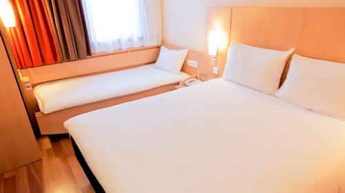 Habitación Triple Estándar del hotel Ibis Lyon Gare La Part Dieu
