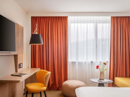 Habitación Doble Clásica con sofá cama del hotel Novotel Lyon Confluence