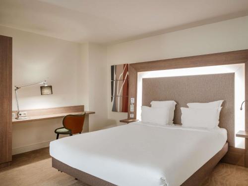 Habitación Doble Executive con sofá cama del hotel Novotel Lyon Confluence. Foto 2