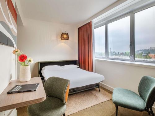 Suite with Double Bed and Double Sofa del hotel Novotel Lyon Confluence. Foto 1