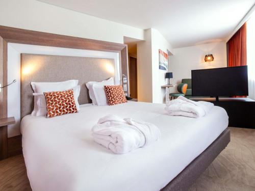 Suite with Double Bed and Double Sofa del hotel Novotel Lyon Confluence. Foto 2