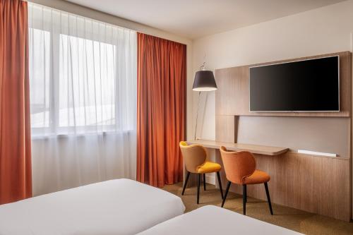 Habitación Doble Clásica - 2 camas del hotel Novotel Lyon Confluence. Foto 6