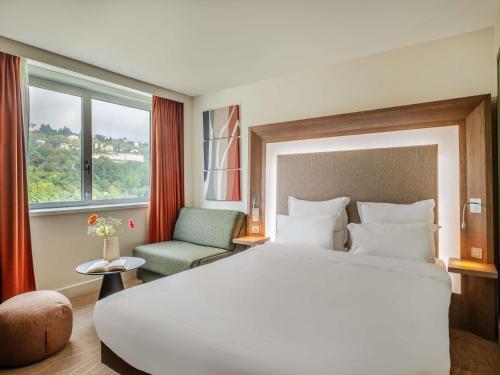 Executive Double Room with Sofa and River View del hotel Novotel Lyon Confluence