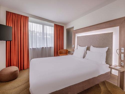 Suite with Double Bed and Double Sofa del hotel Novotel Lyon Confluence. Foto 6