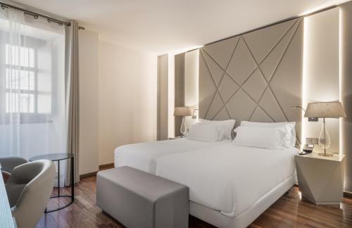 Habitación Doble Superior - 2 camas del hotel NH Salamanca Palacio de Castellanos. Foto 6