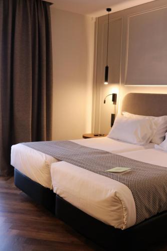 Habitación Deluxe del hotel Silken Rona Dalba. Foto 1