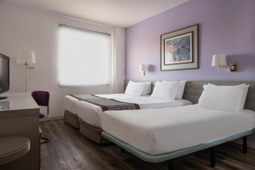 Habitación Triple Estándar del hotel Exe Salamanca. Foto 2