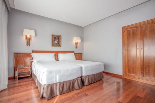 Habitación Superior - 1 cama grande del hotel Regio. Foto 1