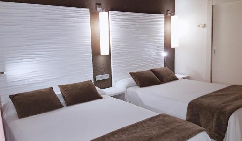 Habitación Triple Estándar del hotel Augustus. Foto 1