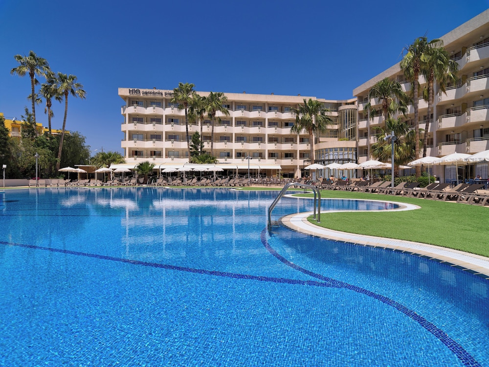 Habitación Doble con vistas a la piscina del hotel H10 Cambrils Playa. Foto 7