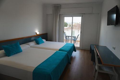 Habitación Doble con terraza - 2 camas del hotel Brisamar Suites. Foto 4