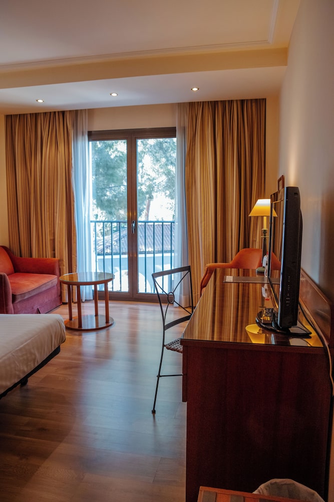 Habitación Deluxe con 1 cama doble o 2 individuales del hotel Termes Montbrio. Foto 10