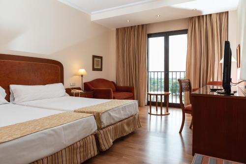 Habitación Doble Deluxe con vistas al jardín - 1 o 2 camas del hotel Termes Montbrio. Foto 3
