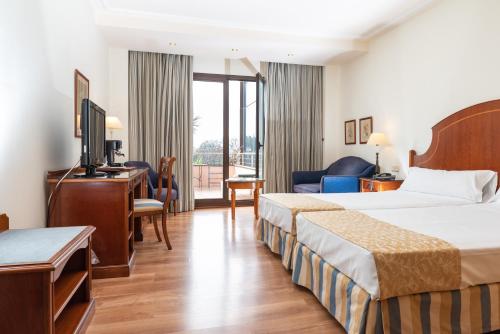 Habitación Doble Deluxe con balcón - 1 o 2 camas del hotel Termes Montbrio. Foto 2