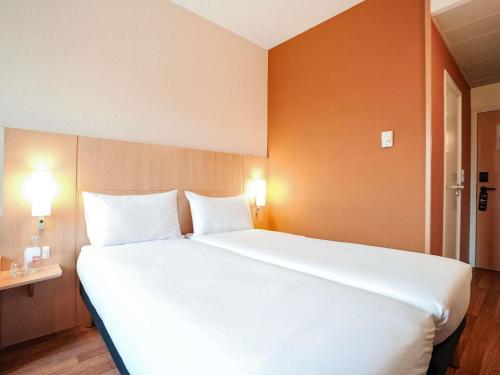Habitación Doble Estándar - 2 camas del hotel Ibis Porto Centro São Bento. Foto 8