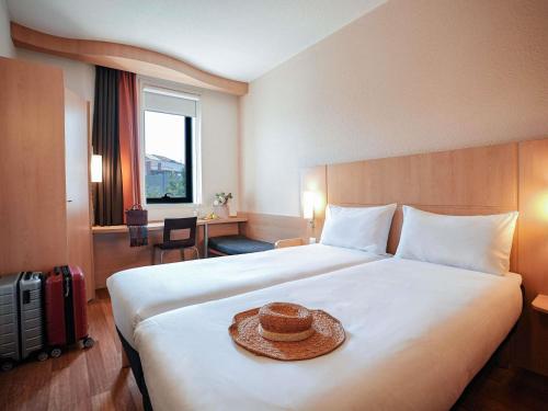 Habitación Doble Estándar - 2 camas del hotel Ibis Porto Centro São Bento. Foto 15