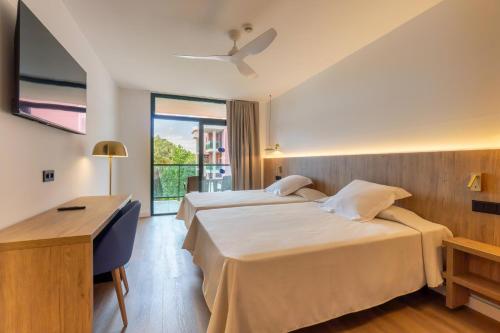 Habitación Cuádruple del hotel Ohtels Vila Romana. Foto 5