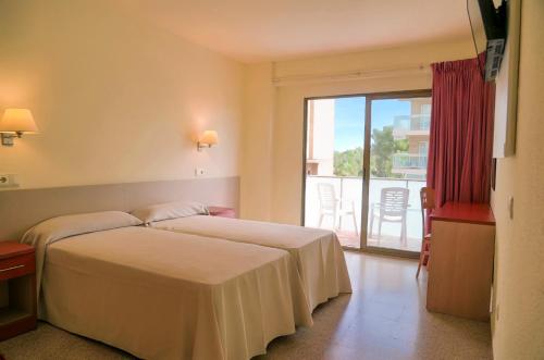 Habitación Doble con cama supletoria del hotel Htop Molinos Park. Foto 5