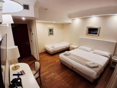 Habitación Triple del hotel Della Valle. Foto 2