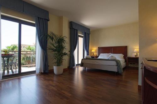 Habitación Cuádruple del hotel Della Valle. Foto 1