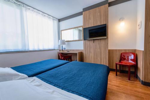 Habitación Doble Clásica con vistas a la ciudad del hotel Colleverde Park. Foto 2