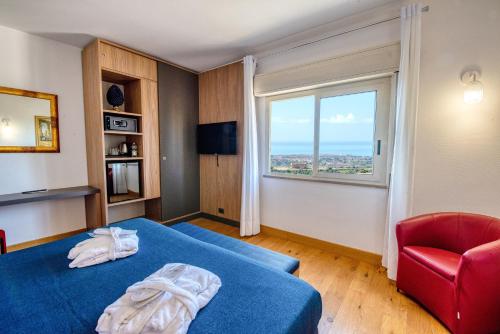 Habitación Doble con vistas panorámicas del hotel Colleverde Park. Foto 1