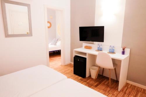 Habitación Triple del hotel Subur. Foto 2