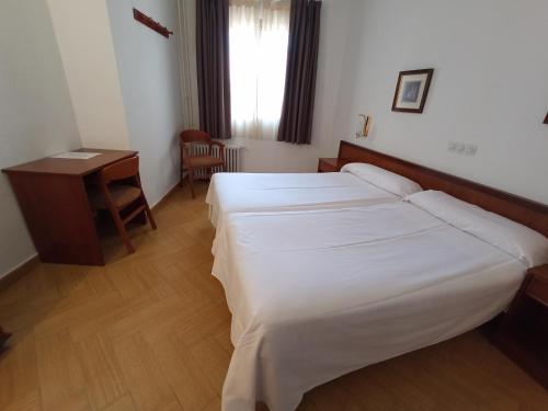 Habitación Doble - 2 camas del hotel Ele Acueducto. Foto 1