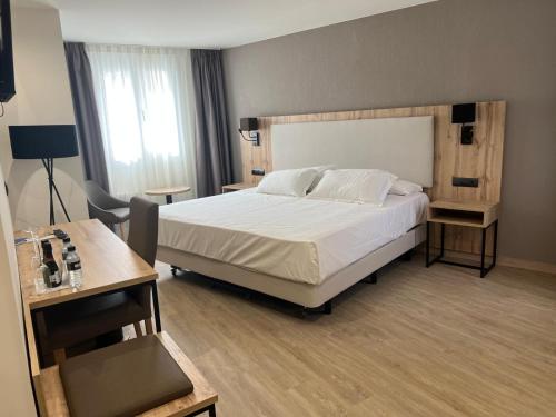 Habitación Superior - 1 cama grande del hotel Ele Acueducto. Foto 1