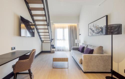 Habitación Dúplex Premium del hotel Ilunion Alcora Sevilla. Foto 1