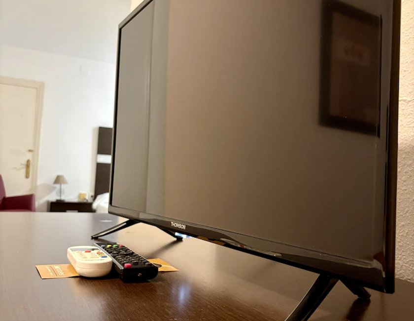 Habitación cuádruple 4 camas individuales del hotel Hospedium Blu Torre de Sevilla,. Foto 3
