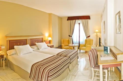 Habitación Doble Estándar - 2 camas del hotel Alcázar De La Reina. Foto 1