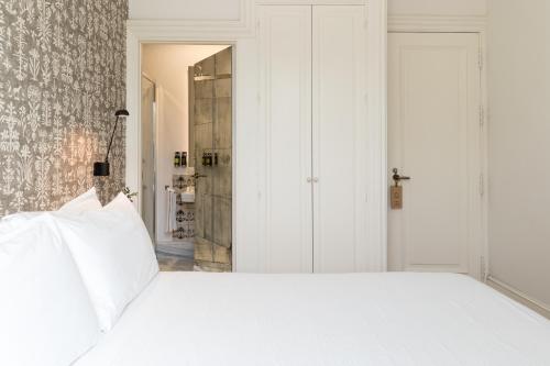 Habitación Doble Pequeña del hotel Tayko Sevilla. Foto 1