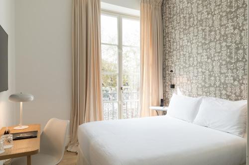 Habitación Doble Pequeña del hotel Tayko Sevilla. Foto 3