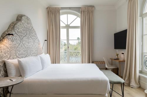 Habitación Doble Deluxe del hotel Tayko Sevilla. Foto 2