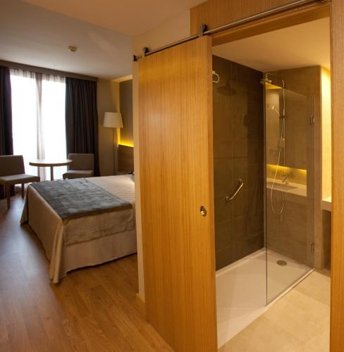 Habitación doble Balcón o Terraza Con Vistas del hotel M.a. Sevilla Congresos. Foto 4