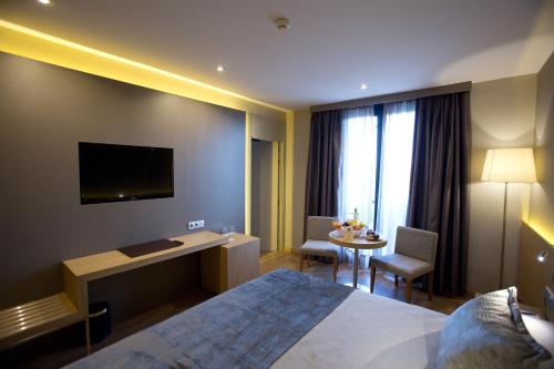 Habitación doble Balcón o Terraza Con Vistas del hotel M.a. Sevilla Congresos. Foto 5