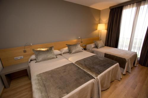 Habitación Familiar del hotel M.a. Sevilla Congresos. Foto 4