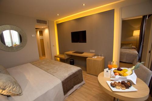 Habitación Familiar del hotel M.a. Sevilla Congresos. Foto 6