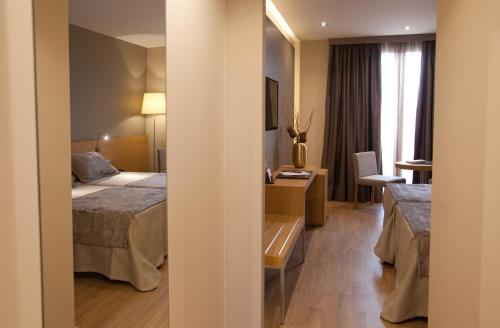 Habitación Familiar del hotel M.a. Sevilla Congresos. Foto 12