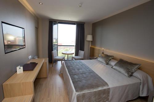 Habitación Doble - 1 o 2 camas del hotel M.a. Sevilla Congresos. Foto 6